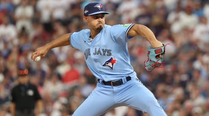 Toronto Blue Jays relief pitcher Jordan Hicks (12) pitches in the in the eighth inning of a game against the Minnesota Twins.